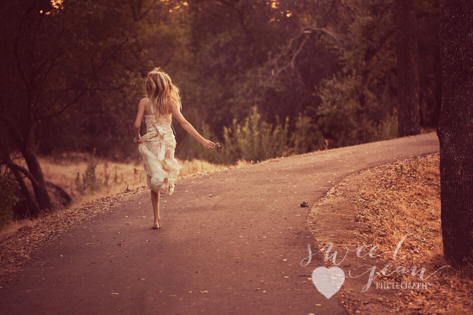 child running down a path during golden hour Natural Light Child Photographer