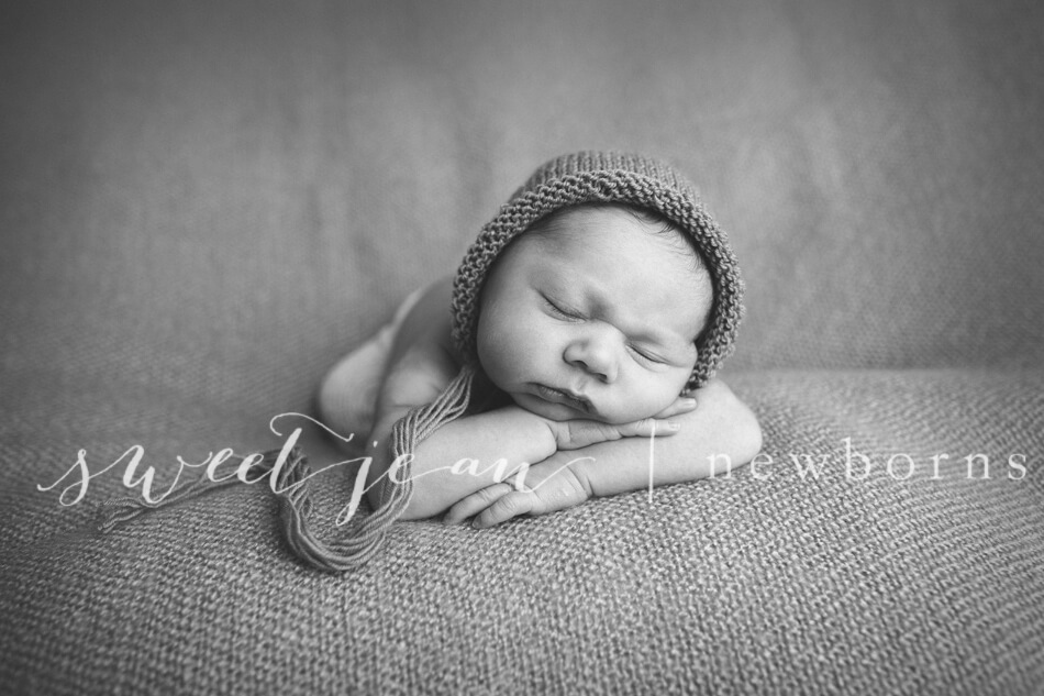 Roseville Photography Studio Newborn baby boy in bonnet